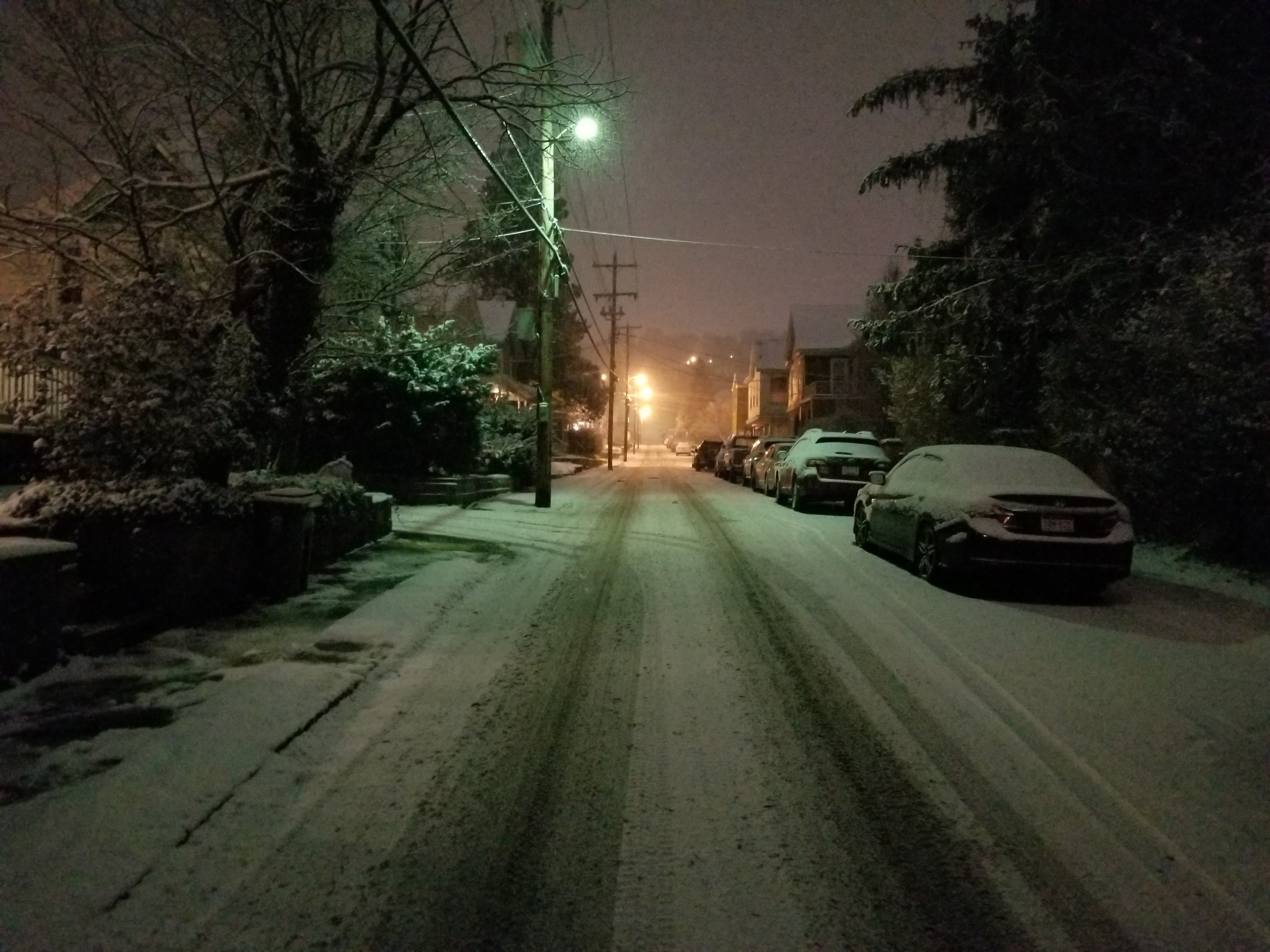 Walking down the middle of the street in a blizzard